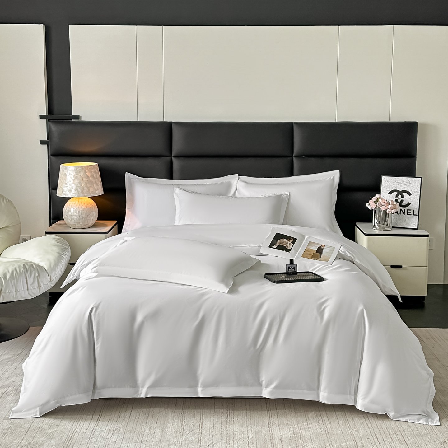 White hotel bedding set styled in a guest room