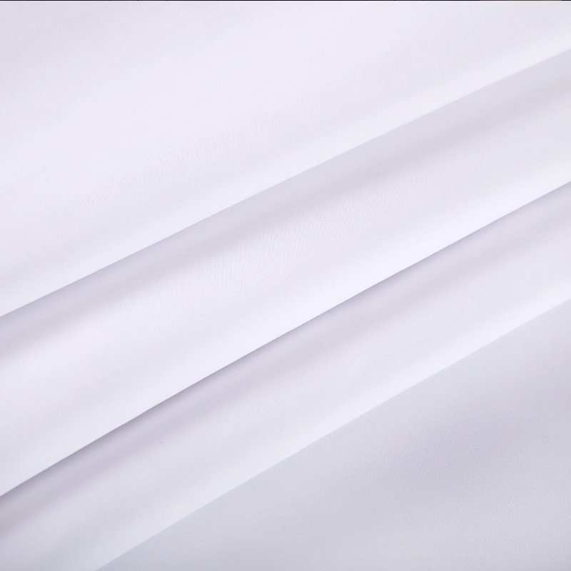 Folded plain weave white fabrics
